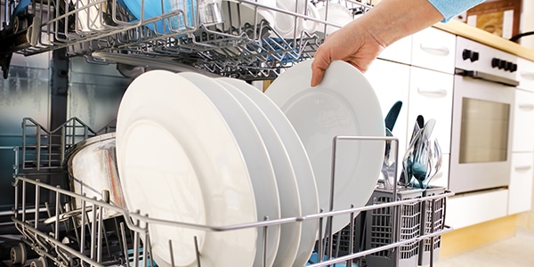 load a dishwasher